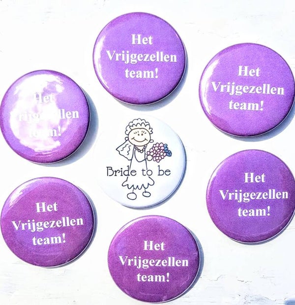 Het Vrijgezellenteam buttons paars 6x en 1x Bride to Be wit
