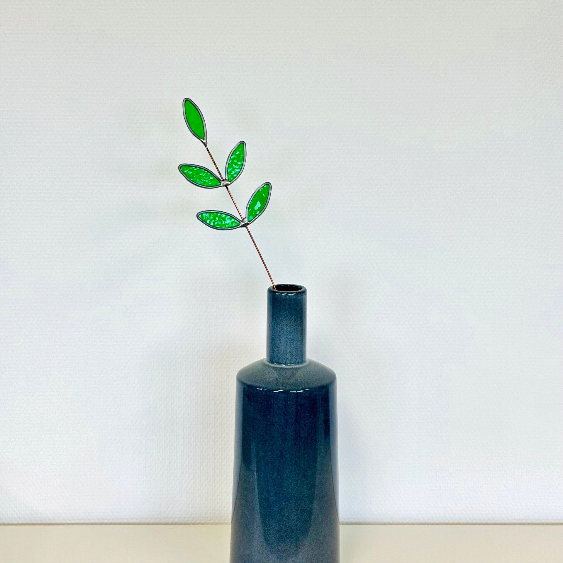 tak met groene blaadjes