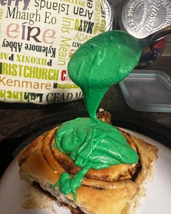 Cinnamon Buns with green cream cheese icing
