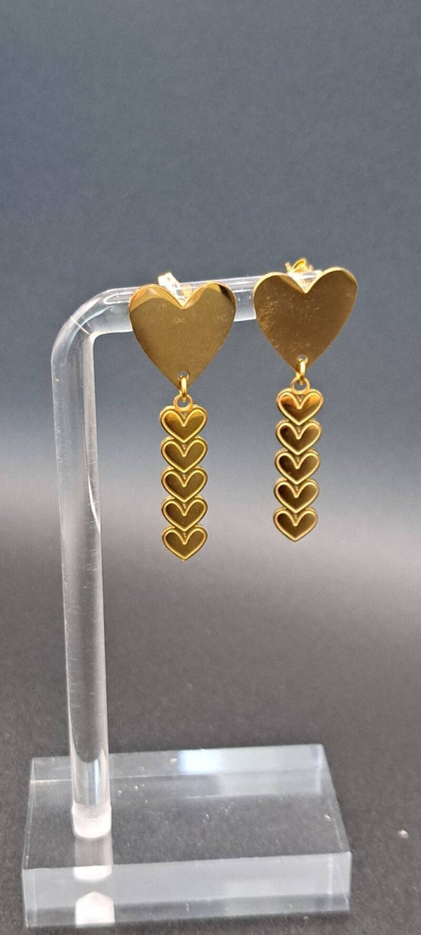 boucle d'oreille dorée coeur