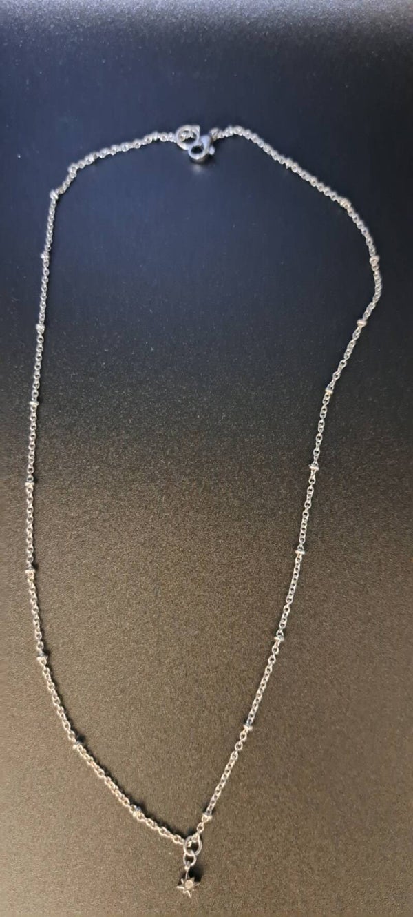 collier argenté étoile