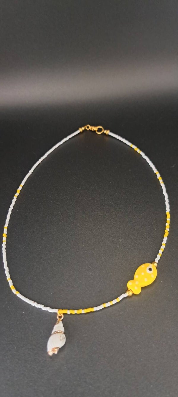 collier en perles miyuki avec son coquillage et son poisson