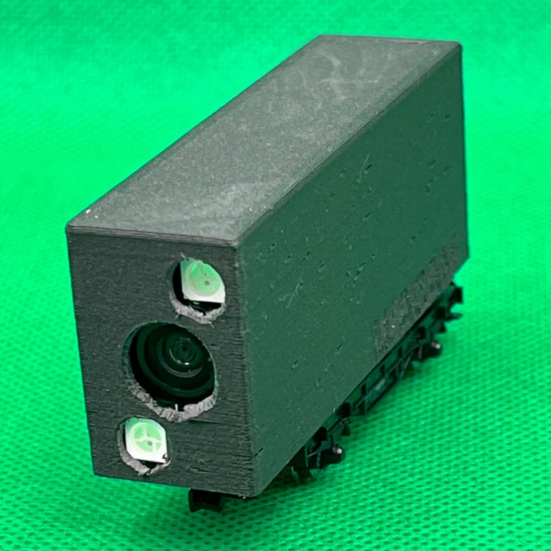 The N scale dump car associated with an ESP32-CAM are the basis for the realization of the WACAM-N on-board camera