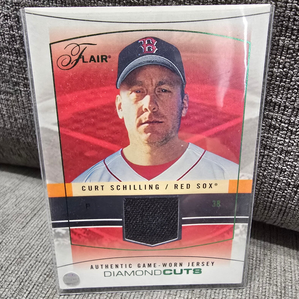 2004 Fleer Curt Schillings game worn jersey.
