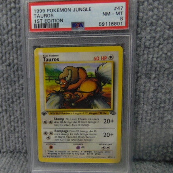 PSA (Grade 8) 1999 Pokemon Jungle 1st Edition Tauros