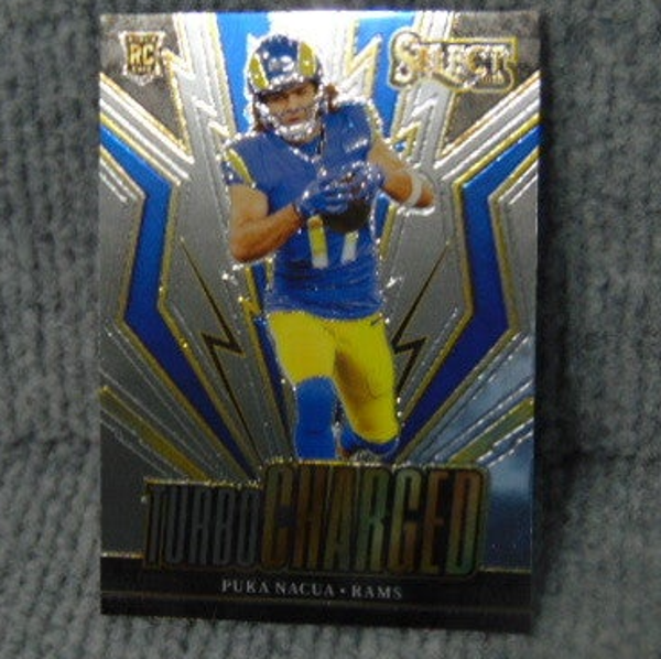 2023 Panini Select Turbo Charge Puka Nacua Rookie Card.