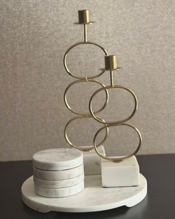 Marmeren set met kandelaren en onderzetters