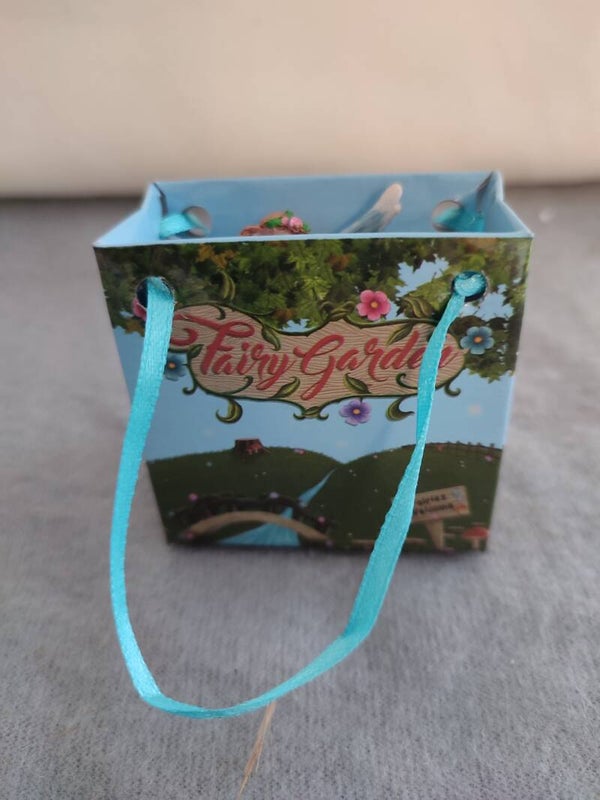 Blumenfee in Geschenktüte