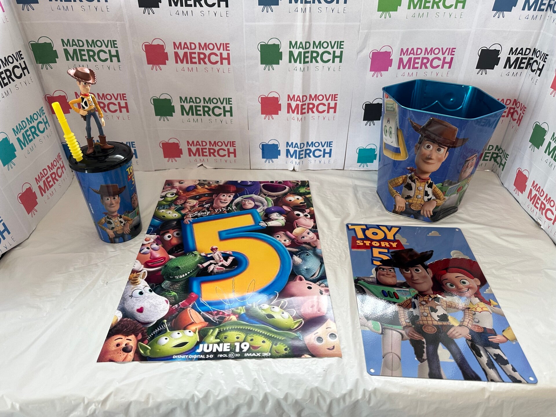 Toy Story 5 popcorn bucket, drinks cup with woody topper and poster bundle