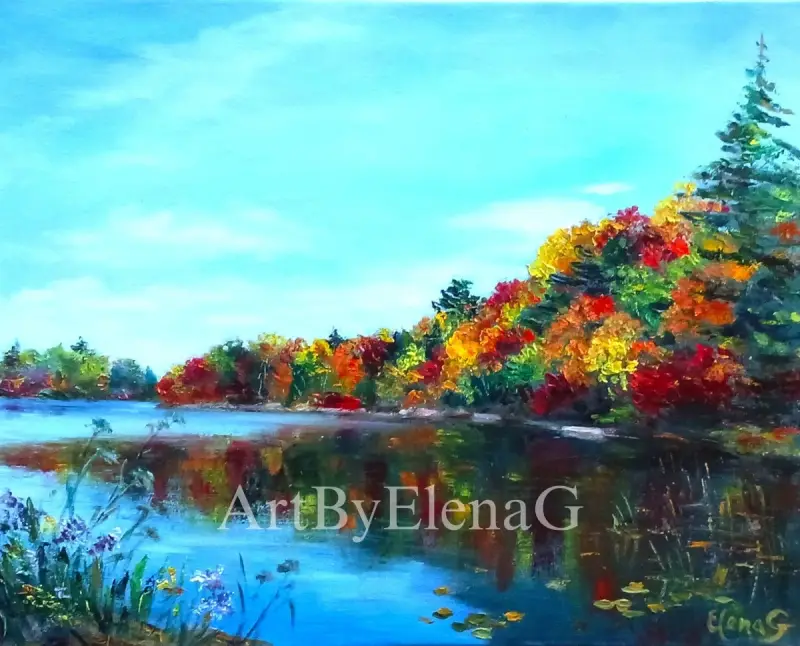 The vivid colours of the autumn forest reflect on the wooded lake, providing a stunning contrast to the pure blue sky above. ElenaG's works are oil on canvas.