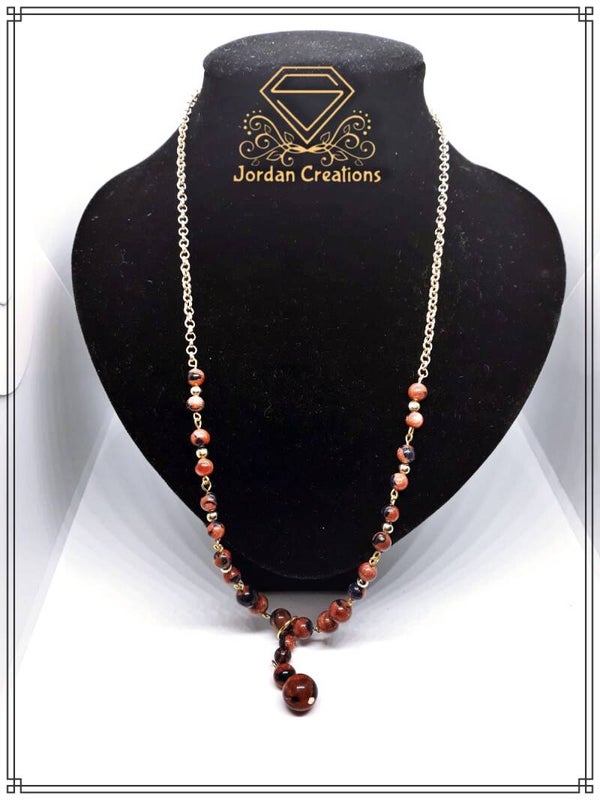 Vergulde ketting met fraaie gevlekte zandsteen