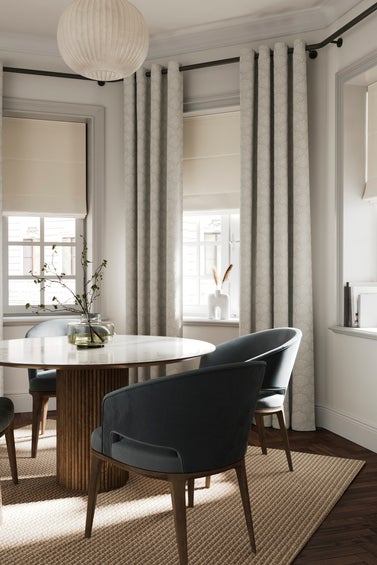 Cream curtains with matching roman blinds available including measuring and fitting service
