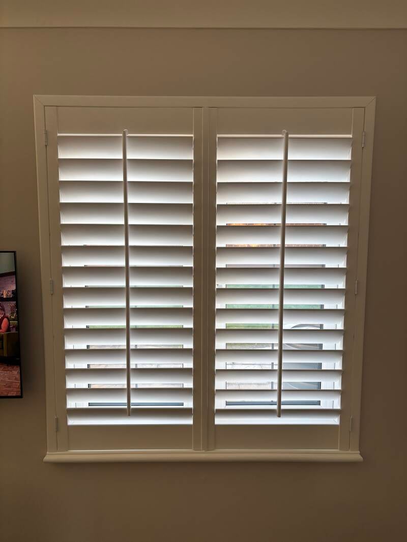 Centre tilt rod shutters fitted in Bromley