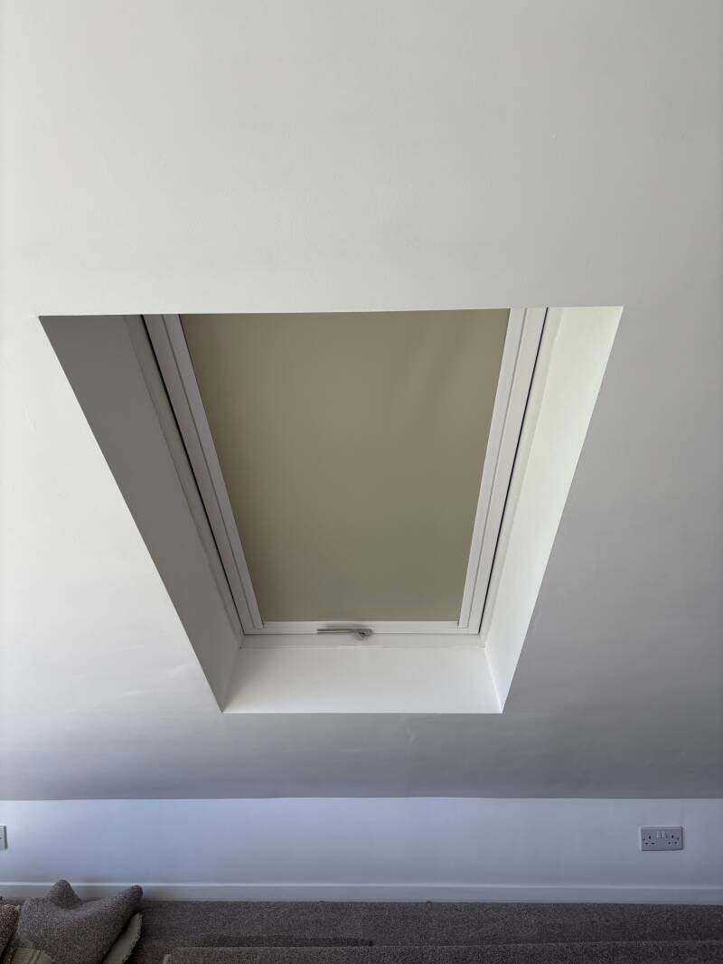 Beige skylight blind professionally fitted in a Whitstable home extension by BlindsFitted.com