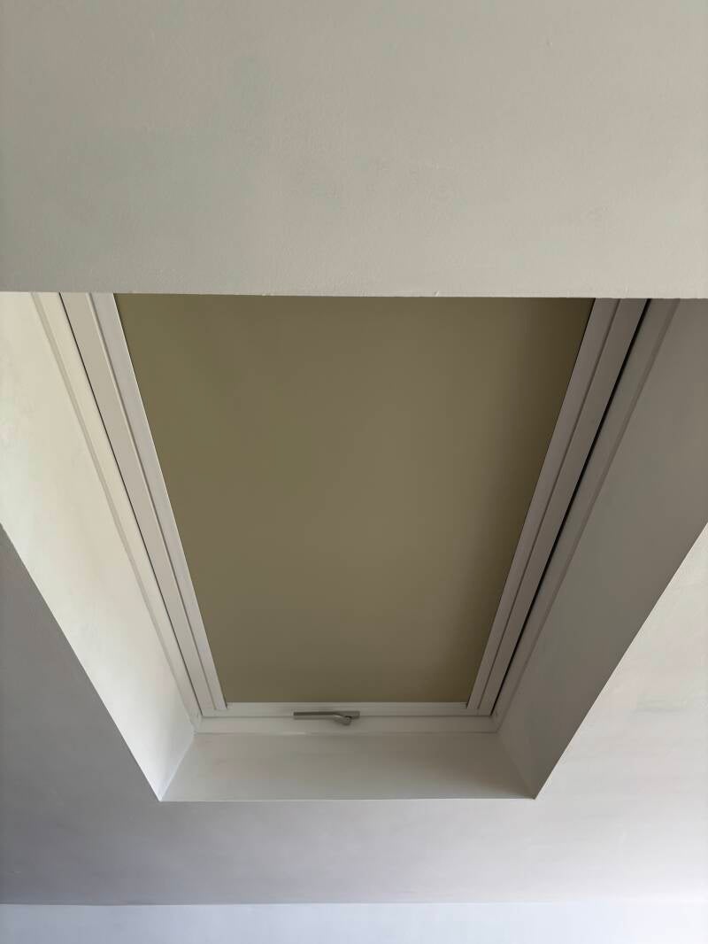 Beige skylight blind professionally fitted in a Whitstable home extension by BlindsFitted.com