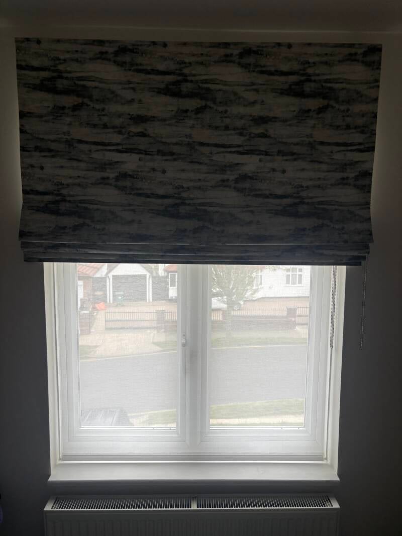 Charcoal roman blind measured, supplied and fitted in Whitstable, Kent.