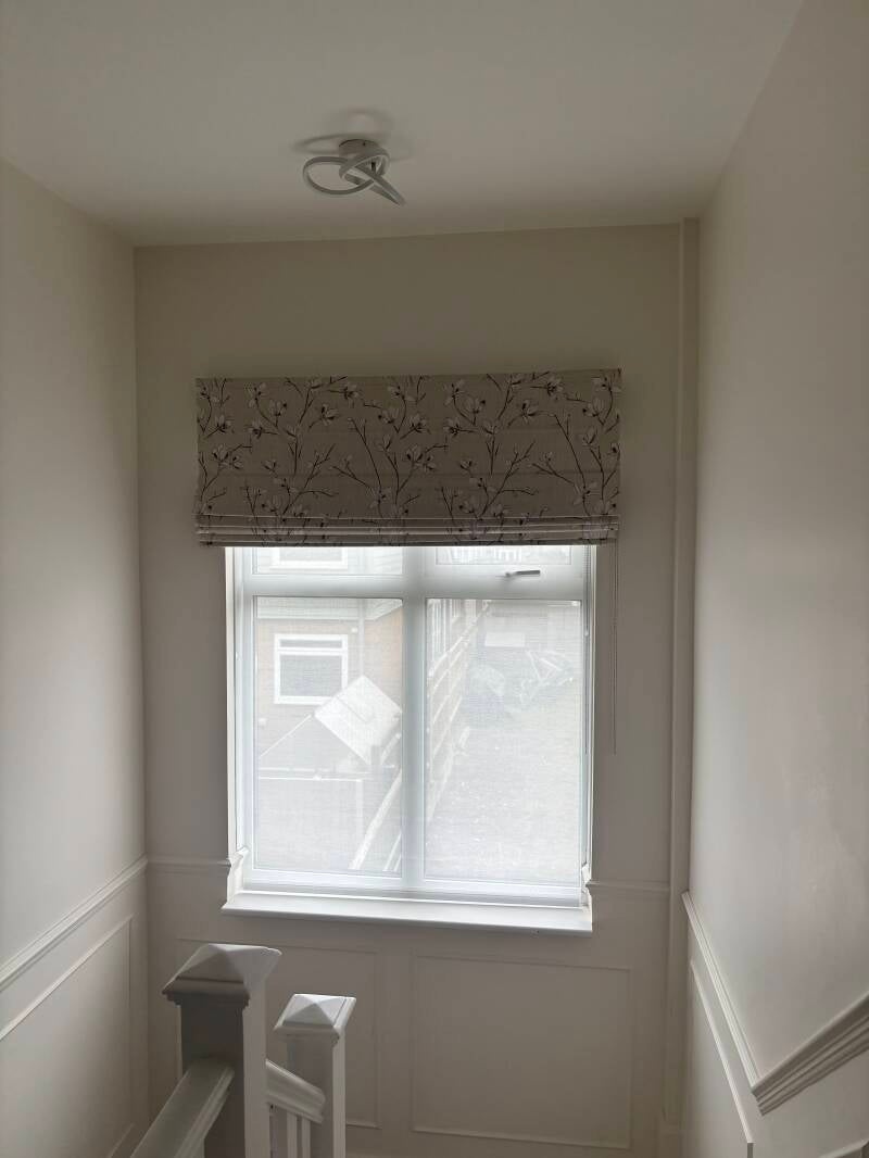Custom floral roman blinds fitted beautifully inside a landing window recess in a Broadstairs home.