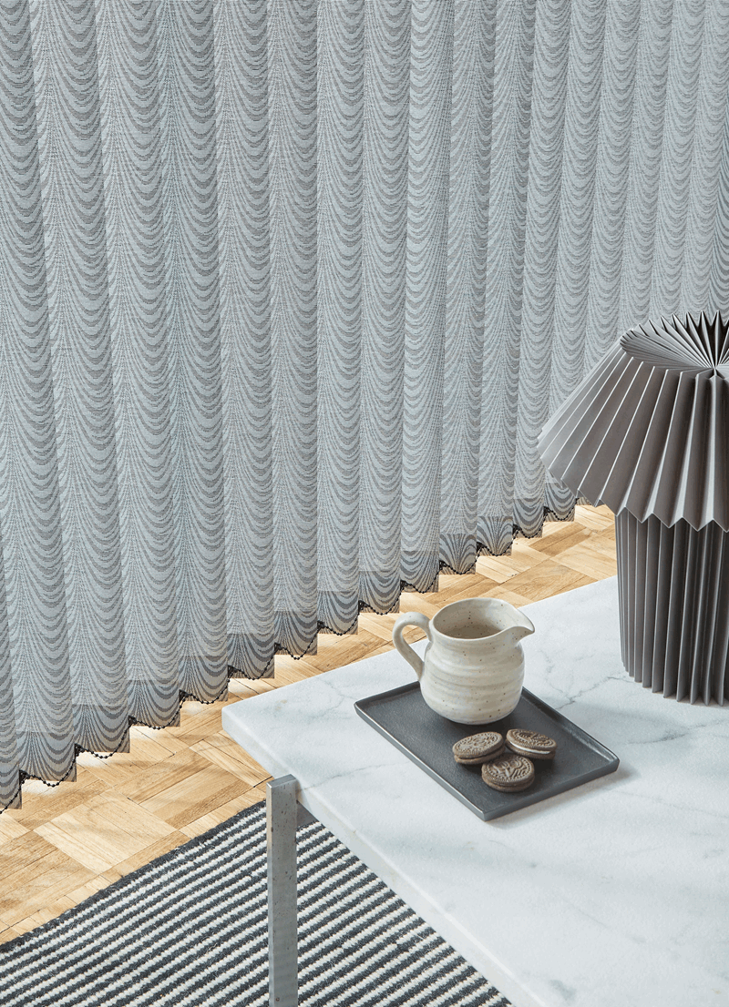 Grey close up of a vertical blind