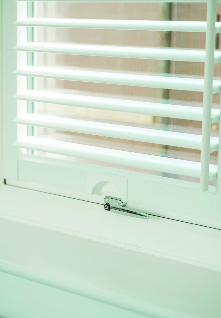 Close up of a perfect fit shutter panel with winodw handle