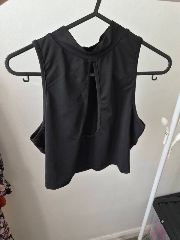 Black cropped top. Size Large but more like a small. By Shein