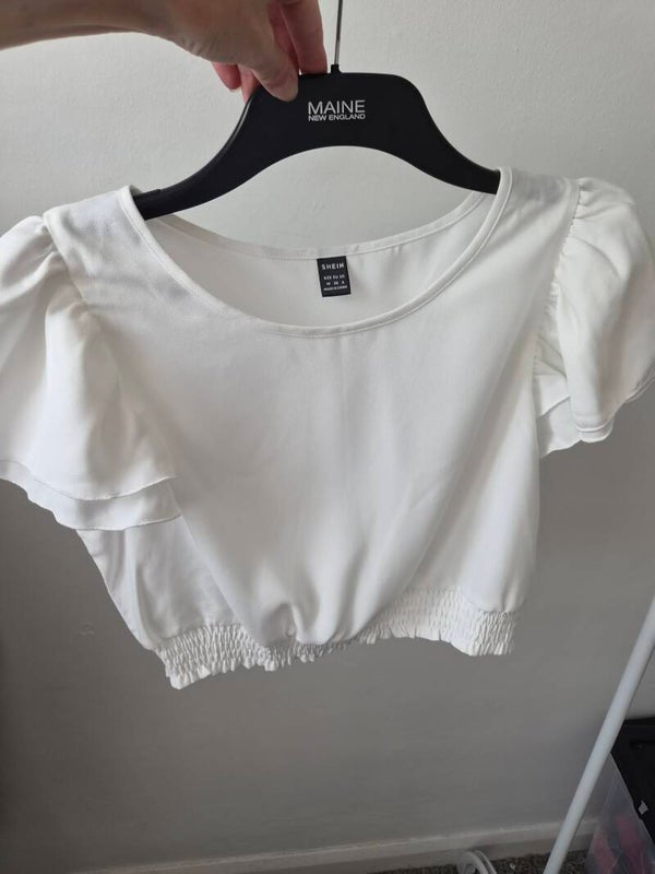 White crop top. Short sleeves. Size medium by Shein