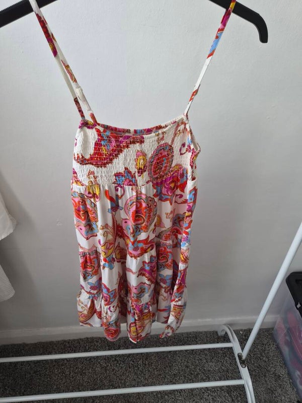 White /multicoloured patterned dress. No size - measures an XS