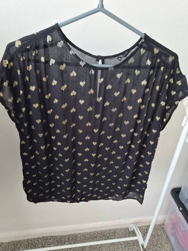 Black/gold patterned cover up top. Size 12 by Next