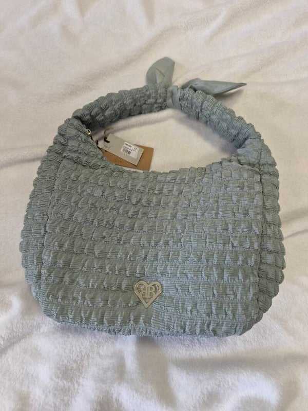 Khaki River Island shoulder bag.