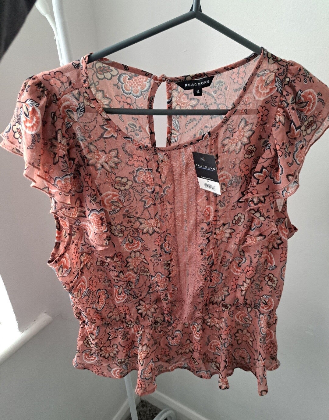 Dusky pink floral top. Size 14 by Peacocks.  New with tags