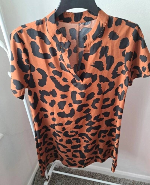 Brown/black patterned short sleeve dress. Size medium.