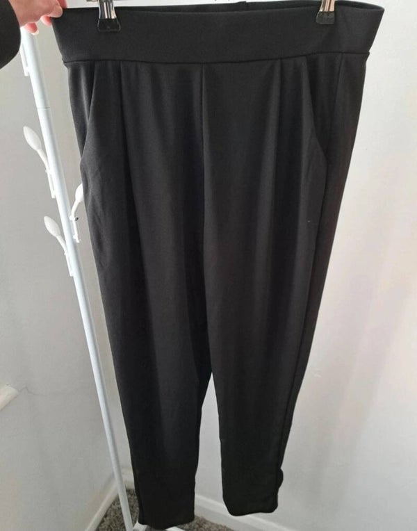 Black trousers. Size large. No brand.