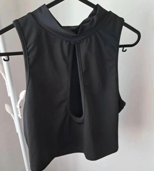 Black cropped top. Size Large but comes up like a small