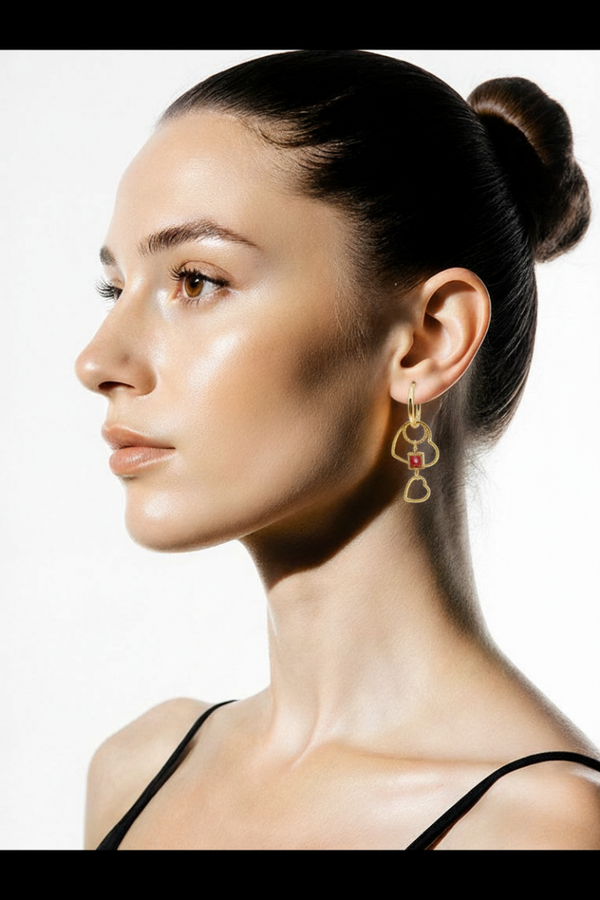 Hartjesoorbellen goudkleurig met fuchsia roze steen