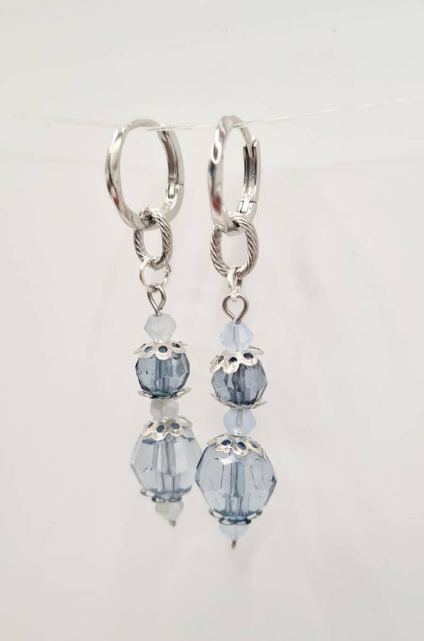 Zilverkleurige oorbellen met lichtblauwe hanger S925 verzilverd