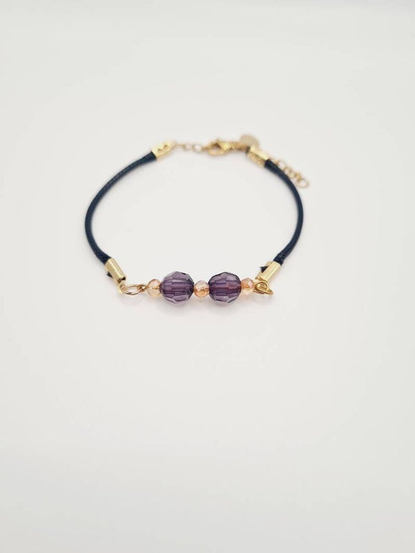Gouden armband met zwarte sparkles