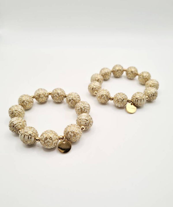 Armband goud - crèmekleurige kralen