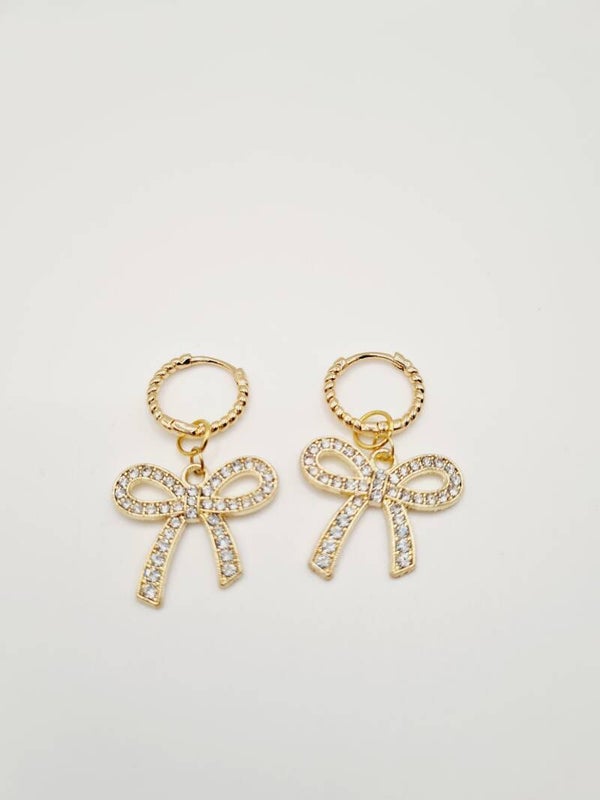 Goudkleurige strikjes oorbellen