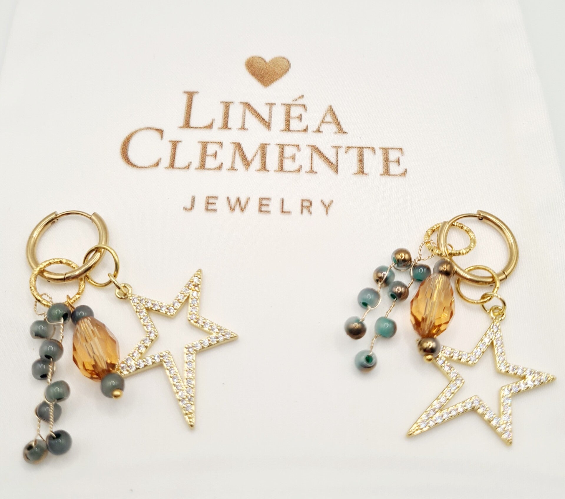 Feestelijke gouden sterren oorbellen