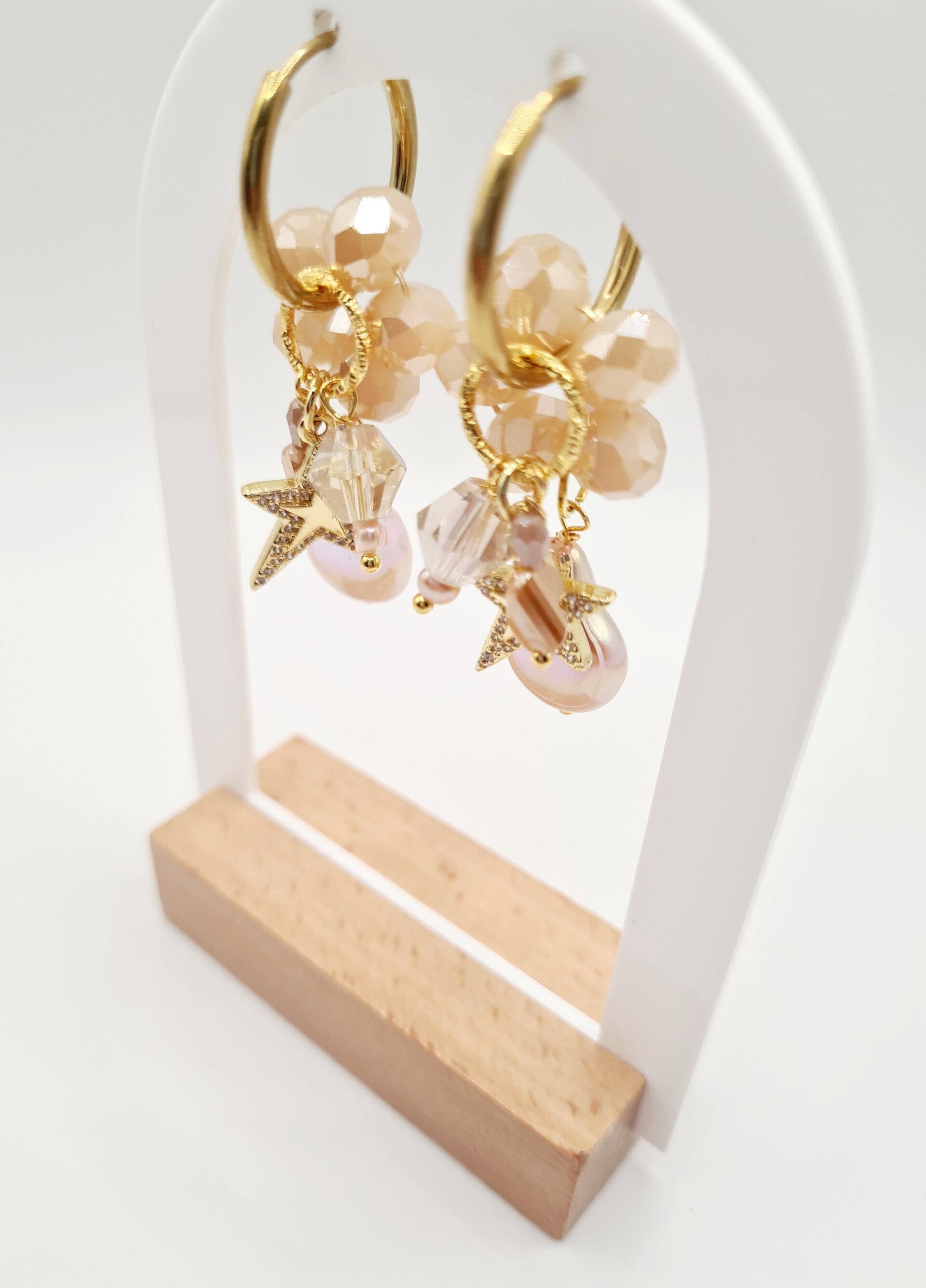 Gouden sterren met champagne kleurige parel & kralen