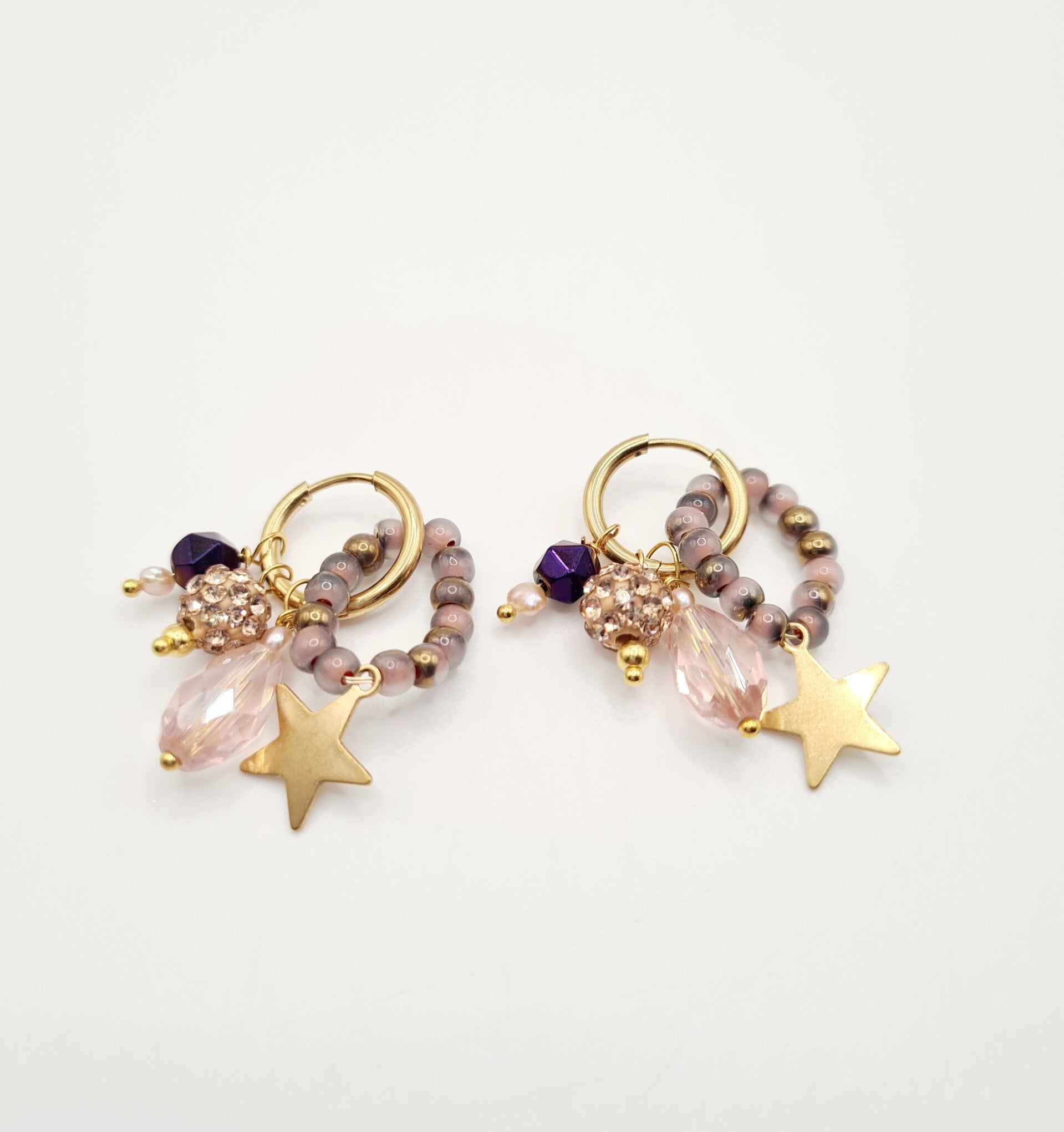 Oorbellen goud paars lila & ster bedel