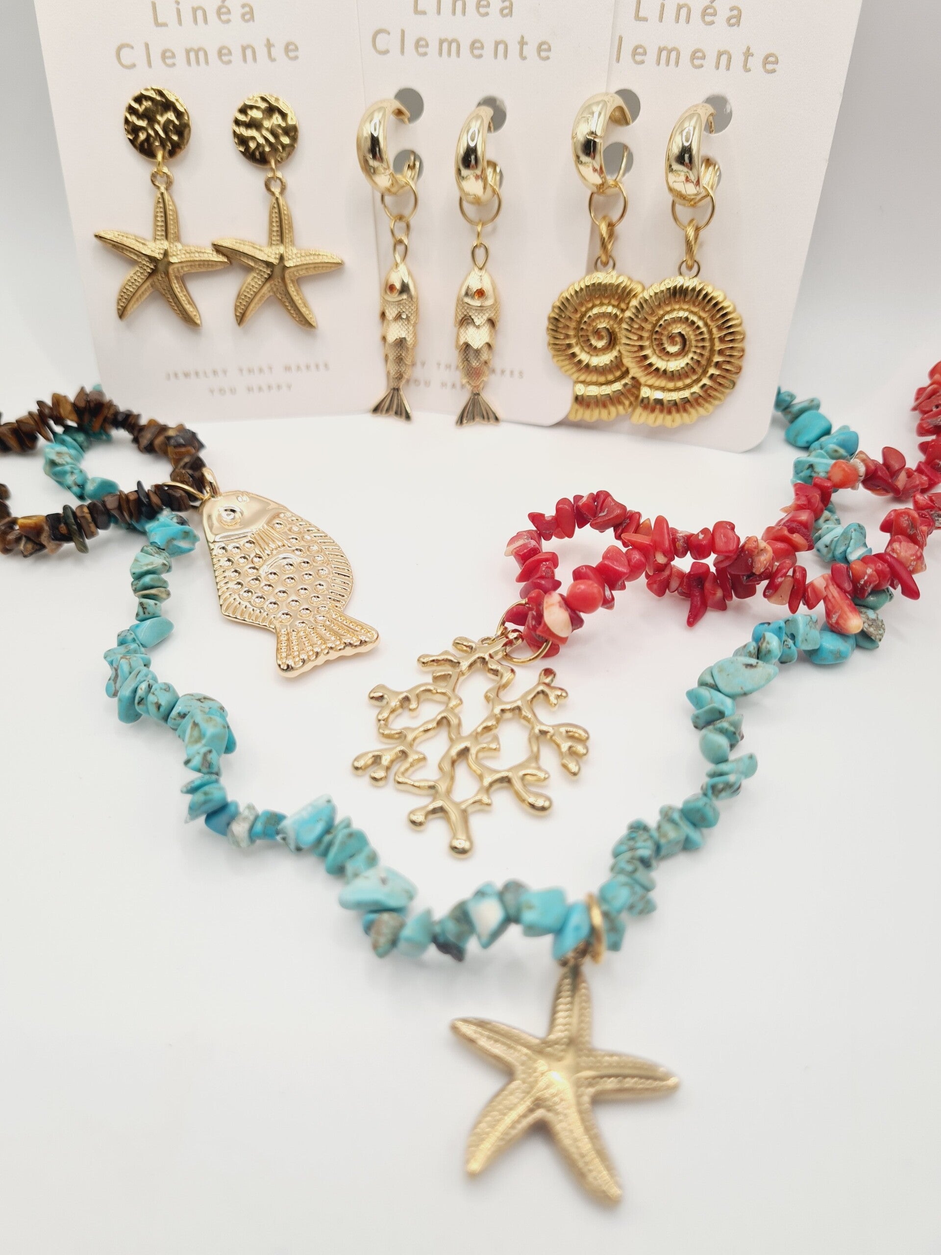 Ketting goud met turquoise, rood of bruin sealife