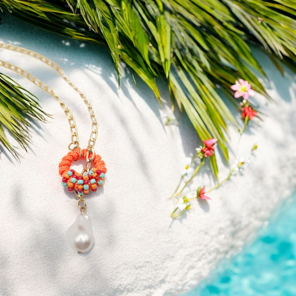 Ketting verstelbaar orange met hart of parel