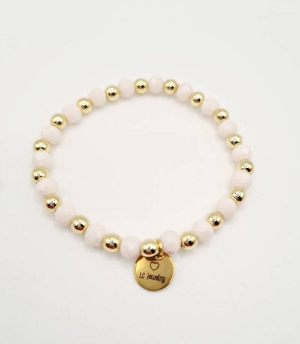Gold filled armband 18k goud 5mm met zachtroze facetkralen