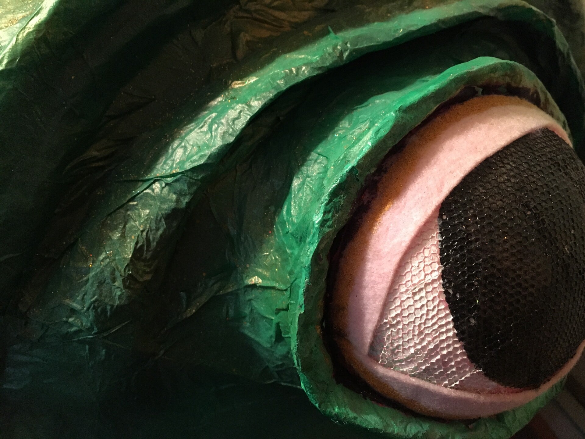 Bulbous frog eye detail from the large frog puppet head