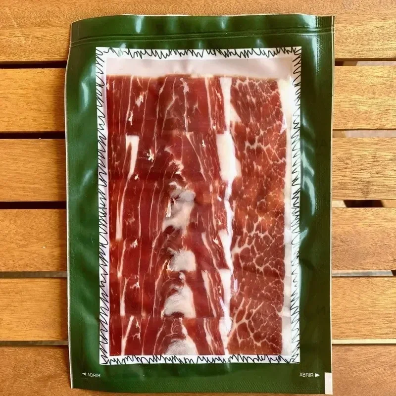 Jambon ibérique coupé à la main. Label vert