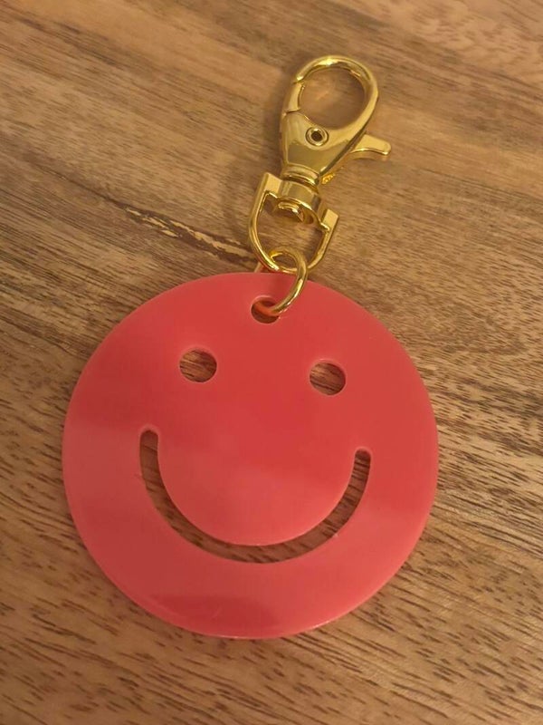 Sleutelhanger smiley neon pink