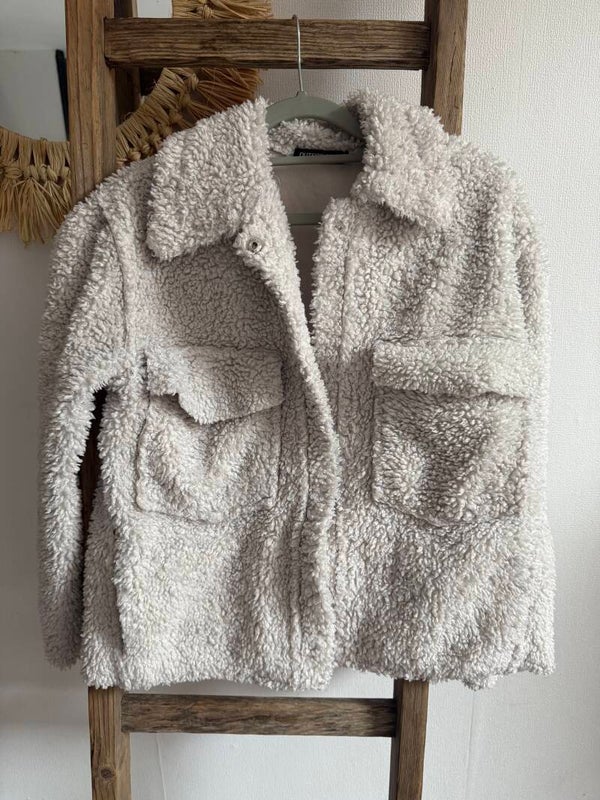 Manteau bouclette peau de mouton intérieur