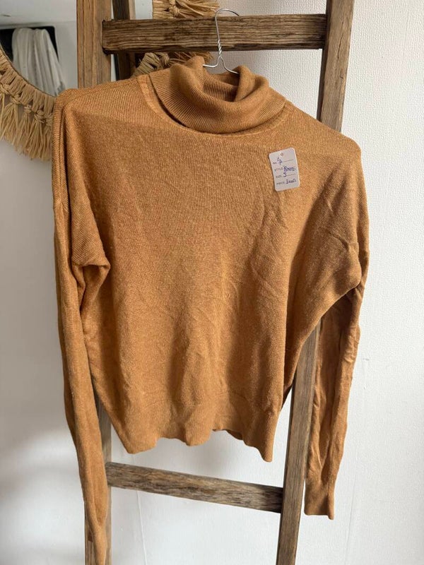 Pull col roulé femme