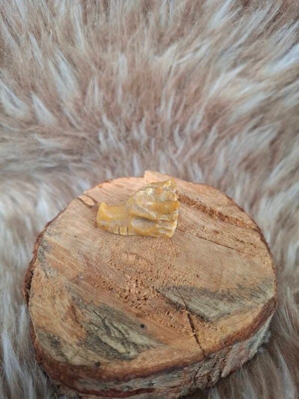 Gele calciet draakje
