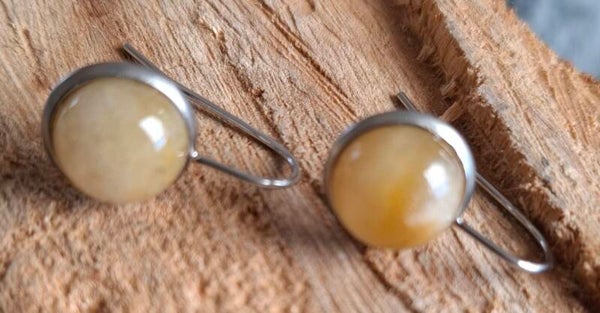Gele calciet oorbellen